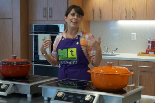 Trustee member Mimi Hall explains how the demonstration Kitchen will not only offer cooking classes, but also fitness groups, such as yoga and a running club.